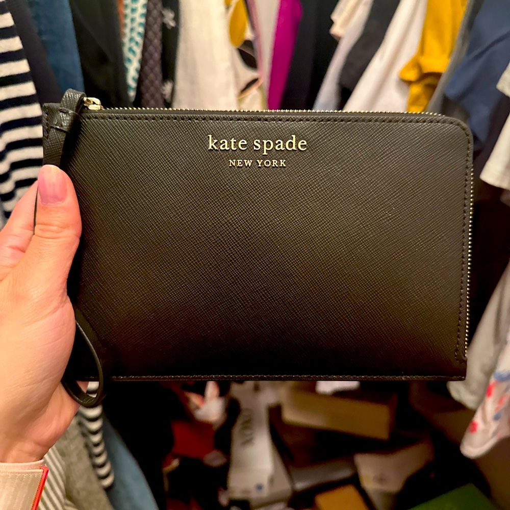 Kate Spade black wristlet. Super versatile and holds just the essentials.